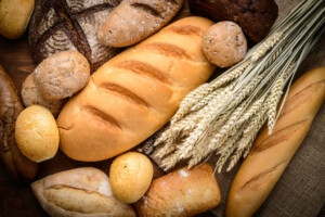 Loaves of bread with wheat stalk
